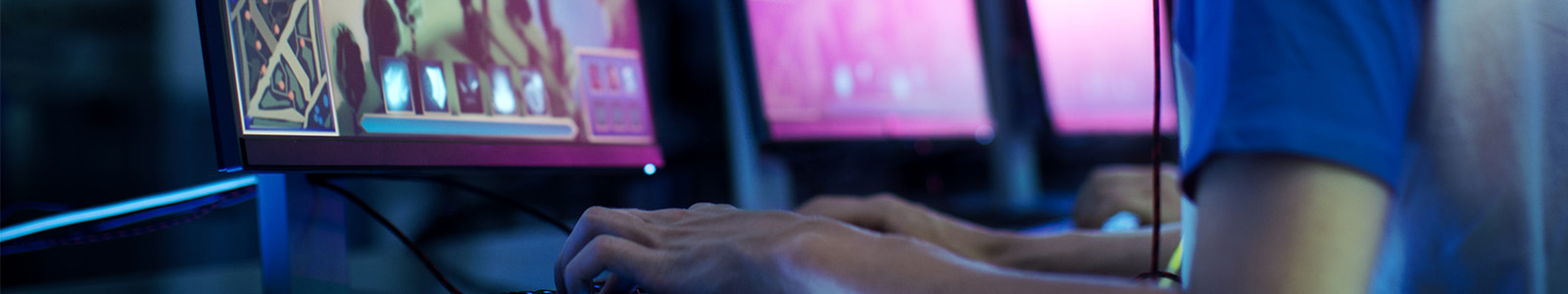 Students playing competitive esports games in a school computer lab