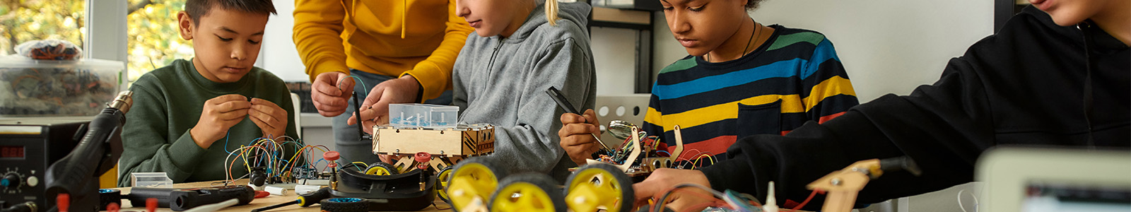 Elementary school children working on STEAM learning projects